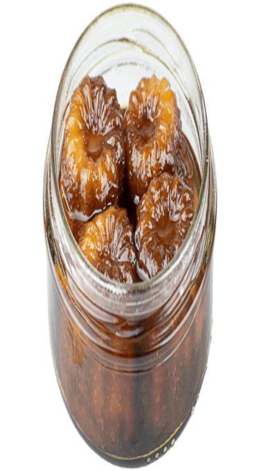 4 canelés bouchée dans un sirop de rhum